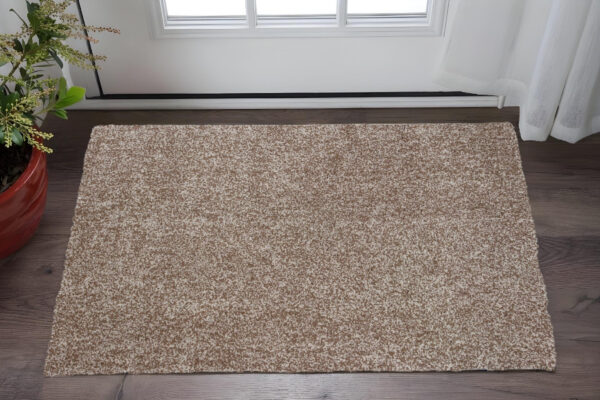 2' X 4' Beige Shag Hand Woven Area Rug