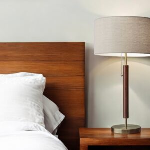 26" Antiqued Brass Solid Wood Table Lamp With Beige Drum Shade