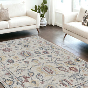9' X 13' Ivory Hand Tufted Space Dyed Floral Traditional Indoor Area Rug