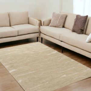 5' X 7' Beige And Ivory Abstract Hand Tufted Area Rug