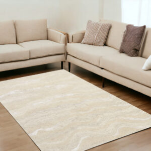 5' X 7' Ivory And Tan Abstract Hand Tufted Area Rug