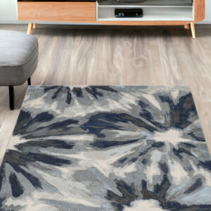 5' X 8' Ivory And Blue Botanical Leaves Area Rug
