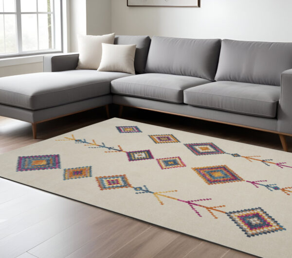 8' X 10' Blue Ivory And Pink Geometric Area Rug
