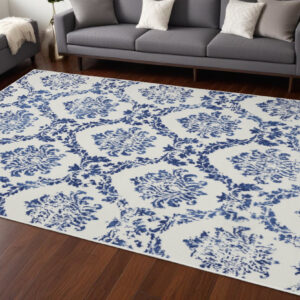 6' X 9' Ivory And Blue Damask Distressed Area Rug