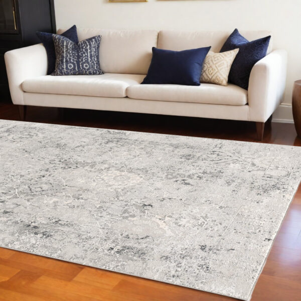 6' X 9' Gray and Ivory Abstract Area Rug