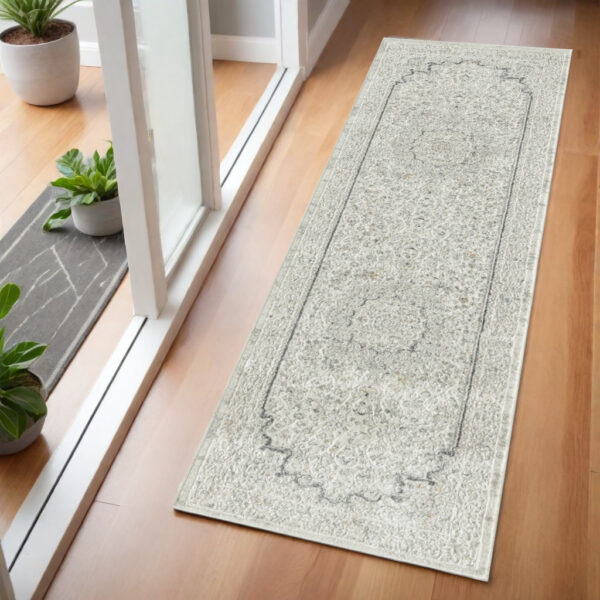 2' X 6' Ivory and Gray Floral Medallion Power Loom Stain Resistant Area Rug