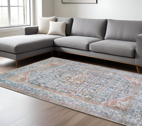 5' X 8' Latte and Blue Oriental Medallion Stain Resistant Area Rug