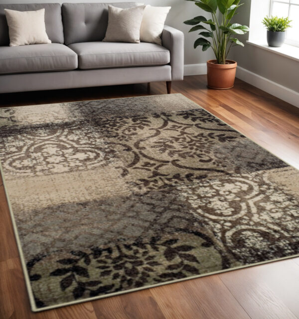 5' X 8' Tan And Brown Damask Distressed Stain Resistant Area Rug