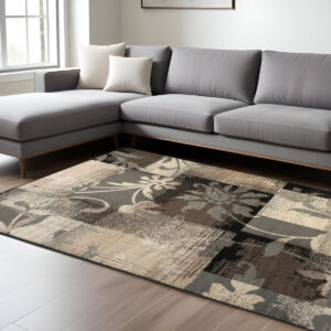 6' X 9' Beige And Gray Floral Power Loom Distressed Stain Resistant Area Rug