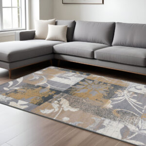 7' X 9' Beige And Gray Floral Power Loom Distressed Stain Resistant Area Rug
