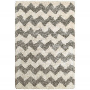 5' X 8' Grey And Ivory Geometric Shag Power Loom Stain Resistant Area Rug