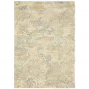 8' X 11' Grey Ivory Beige And Taupe Abstract Power Loom Stain Resistant Area Rug