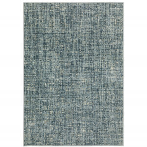 5' X 7' Dark Blue Light Blue Grey Ivory And Beige Abstract Power Loom Stain Resistant Area Rug