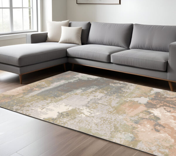 8' X 11' Gray Pink And Cream Abstract Area Rug