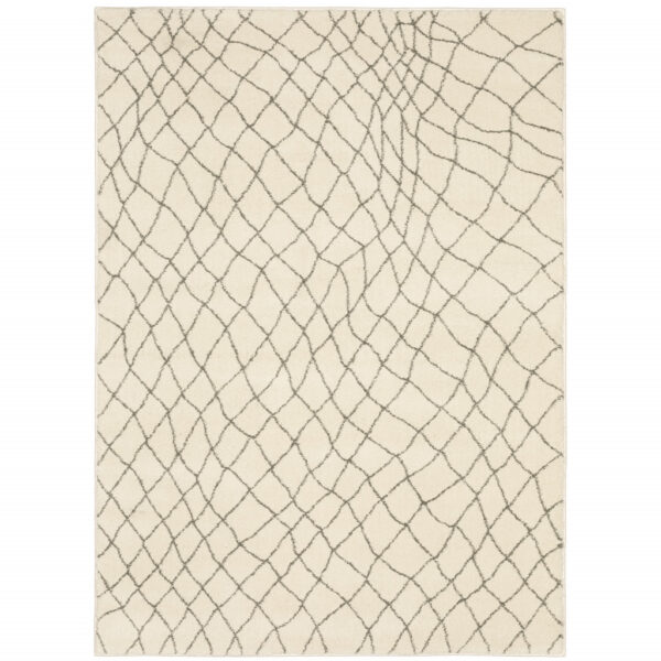 7' X 9' Gray And Ivory Geometric Shag Area Rug