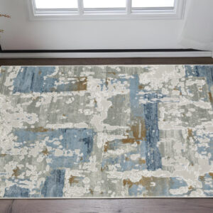 3' X 5' Grey Blue Navy Ivory And Brown Abstract Power Loom Stain Resistant Area Rug