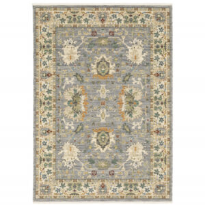 5' X 8' Blue And Ivory Oriental Power Loom Stain Resistant Area Rug With Fringe