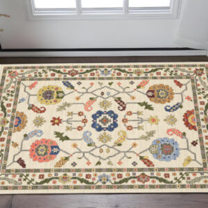 3' X 5' Ivory Green Blues Pink Yellow Rust Brown Tan And Grey Oriental Power Loom Stain Resistant Area Rug With Fringe
