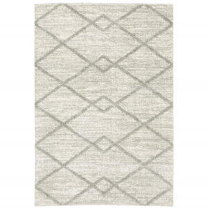 5' X 8' Ivory And Grey Geometric Shag Power Loom Stain Resistant Area Rug