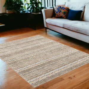 5' X 7' Gray and Ivory Abstract Power Loom Area Rug