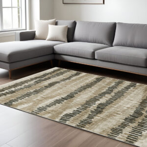 10' X 13' Beige Ivory Charcoal Brown Tan And Grey Abstract Power Loom Stain Resistant Area Rug With Fringe