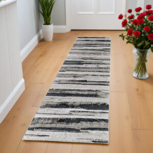 8' Beige and Black Abstract Distressed Runner Rug