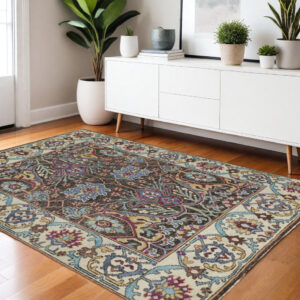 4' X 6' Ivory and Blue Wool Floral Hand Knotted Distressed Area Rug With Fringe