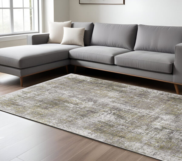 7' X 10' Gray and Ivory Abstract Non Skid Area Rug With Fringe