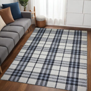5' X 8' Ivory Blue And Black Abstract Hand Woven Stain Resistant Area Rug