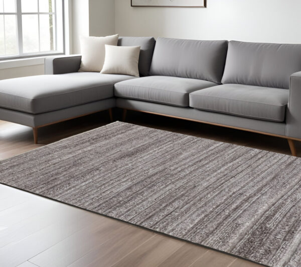 8' X 10' Taupe Brown And Ivory Striped Hand Woven Stain Resistant Area Rug