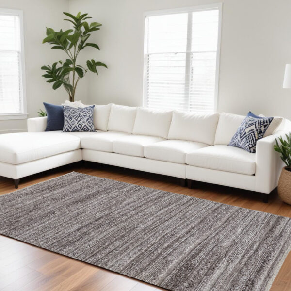 9' X 12' Gray and Ivory Striped Shag Hand Woven Area Rug