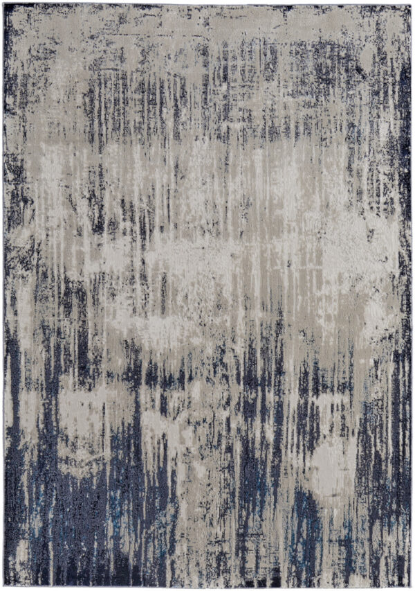 7' X 10' Tan Blue And Ivory Abstract Power Loom Distressed Area Rug