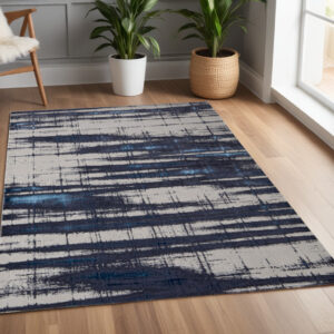 4' X 6' Ivory and Blue Abstract Power Loom Distressed Non Skid Area Rug