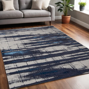 5' X 8' Ivory and Blue Abstract Power Loom Distressed Non Skid Area Rug