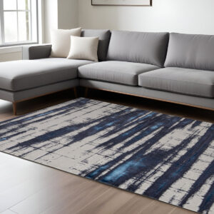 8' X 10' Ivory and Blue Abstract Power Loom Distressed Non Skid Area Rug
