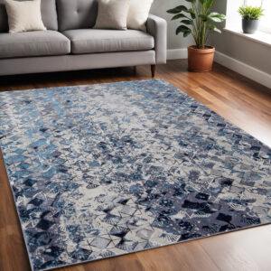 5' X 8' Blue Ivory And Gray Geometric Power Loom Distressed Area Rug