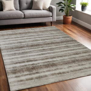 5' X 8' Tan and Ivory Abstract Hand Woven Area Rug