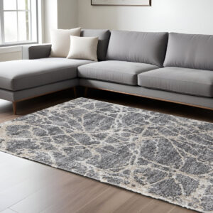 9' X 12' Gray And Ivory Abstract Power Loom Stain Resistant Area Rug