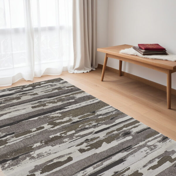 5' X 8' Gray and Ivory Abstract Power Loom Distressed Area Rug