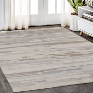 5' X 8' Brown and Ivory Abstract Power Loom Distressed Area Rug