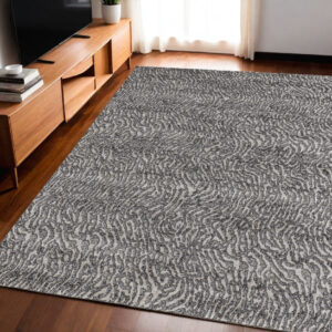 5' X 8' Gray and Ivory Abstract Power Loom Area Rug