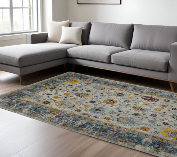 9' X 12' Blue and Orange Floral Power Loom Area Rug
