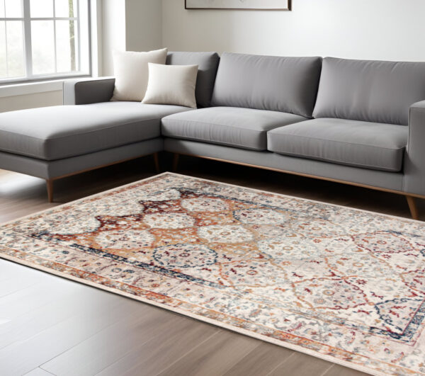 9' X 12' Beige Rust and Navy Floral Medallion Power Loom Area Rug