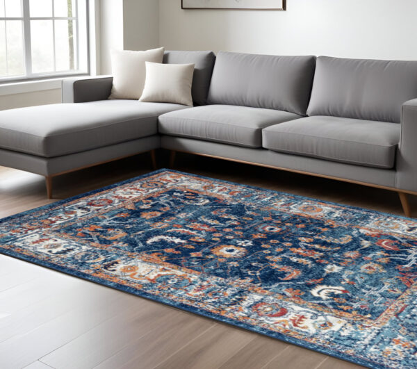 8' X 10' Blue Rust and Orange Floral Power Loom Area Rug