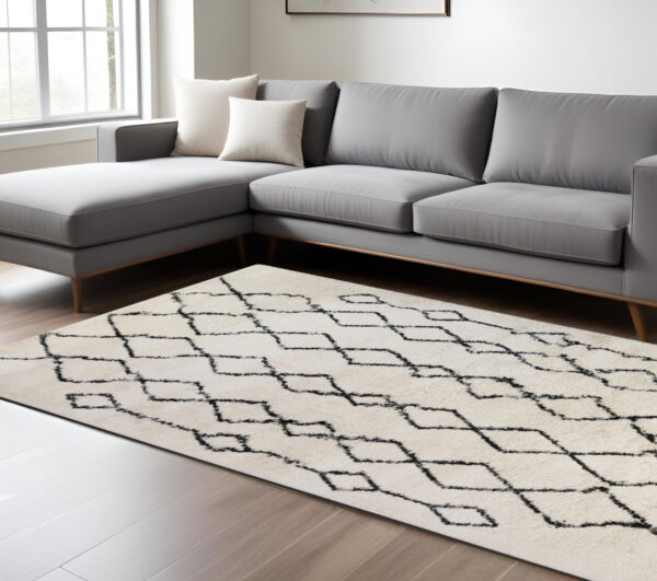 7' X 9' Black and Ivory Geometric Shag Area Rug