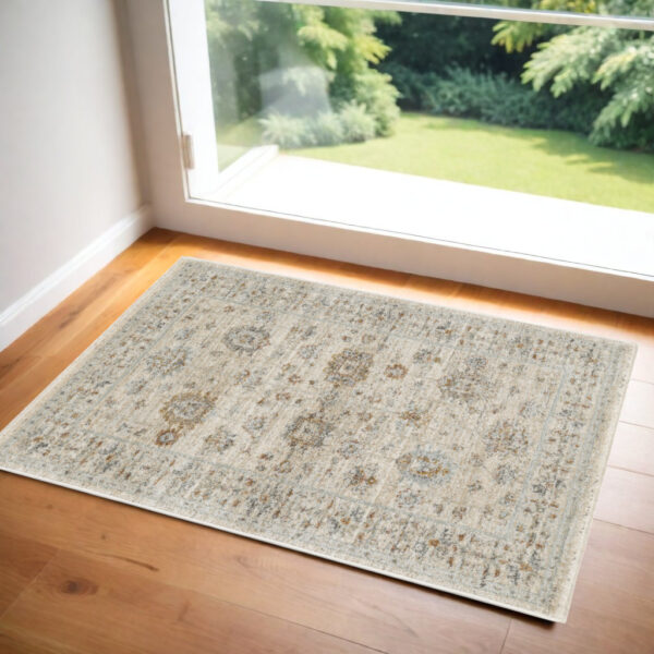3' X 5' Beige and Ivory Oriental Power Loom Distressed Area Rug With Fringe