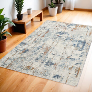 4' X 6' Beige and Blue Abstract Power Loom Area Rug