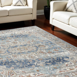7' X 10' Blue and Ivory Medallion Power Loom Distressed Area Rug