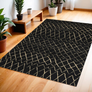 4' X 6' Black and Ivory Abstract Power Loom Distressed Area Rug