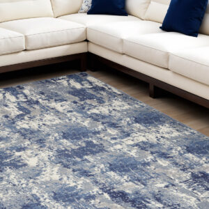 8' X 10' Blue and Ivory Abstract Power Loom Area Rug